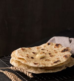 delicious-roti-assortment-table-with-copy-space_23-2149033967